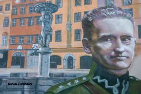 Przy ul. Joachima Lelewela 13, tuż obok Młodzieżowy Dom Kultury, powstało  wielkoformatowe malowidło upamiętniające Mieczysława Kozara-Słobódzkiego