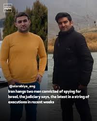 Iran hangs two men convicted of spying for Israel, the judiciary says, the  latest in a string of executions in recent weeks.