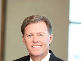 Redundancy after merger led to Scanlon's departure from FNF as CEO