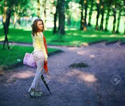 A woman's closet is her pride and joy, at least it can be. Modern Portrait Of Elegant Outfit Teen Girl With Fashion Purse Or Luxury Handbag Happy Young Woman With Violet Leather Bag Casual Beauty Luxury Lifestyle Fashion Clothes Stock Photo Picture And Royalty Free