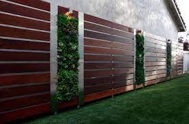 Concrete paths, patios, and steps that consist of metal or wooden accents are common choices for modern landscaping ideas. Think Green 20 Vertical Garden Ideas