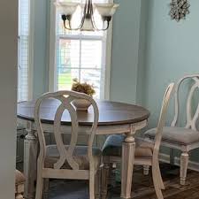 Realyn Dining Extension Table In 2020 Oval Table Dining Extension Table Dining Table