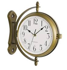 It is double sided so you will be able to see the time from wherever you stand. Bestime Antique Bronze Finish 13inch Double Sided Wall Clock Wrought Iron Metal Quiet Easy Read Two Faces Station Clock For Garden Home Decor Indoor Outdoor Living Room Study Wall Decoration Buy Online