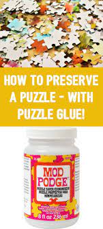 Mod podge puzzle saver makes it easier for you to preserve your completed puzzles. How To Use Puzzle Glue Mod Podge Puzzle Saver Puzzle Crafts Puzzle Piece Crafts Puzzle Glue