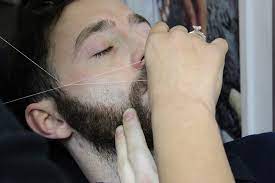 Men typically start developing facial hair in the later stages of puberty or adolescence, around fifteen years of age. Facial Hair Threading For Men