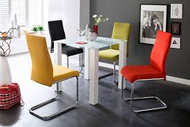 Usually, we would see dining rooms having dining sets in single colors. Colorful Dining Chairs To Brighten Your Dining Space