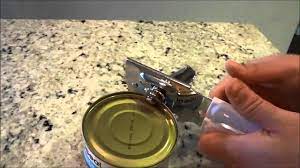 To use a manual can opener, open the arms of the can opener and place the metal tooth on the lip of the can. How To Use A Can Opener Tutorial Youtube