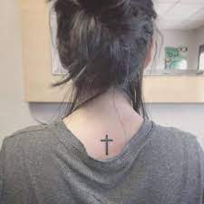 Cross tattoo meanings, designs and ideas with great images for 2021. Upper Back Christian Cross Tattoo