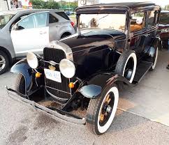 Image result for Scaraba Green 1930 Oldsmobile