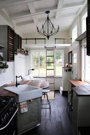 A tiny home bathroom has to accommodate a bathroom, a shower and/or bathe, and a sink in a really small quantity of space. Tiny Getaway House 27 Farmhouse Style Apron Front Sink With Coordinating Faucet Integrated Pull Out Tiny House Kitchen House Design Kitchen Modern Tiny House