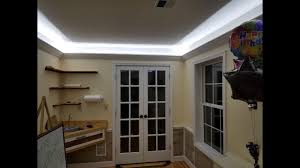 The trick consists in installing crown molding around your ceiling. How To Design And Install Crown Molding With Indirect Led Lighting For Less Than 125 Youtube
