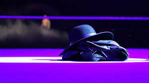 Suddenly The Undertaker S Hat And Jacket Appear In The Ring John Cena Undertaker Wrestlemania