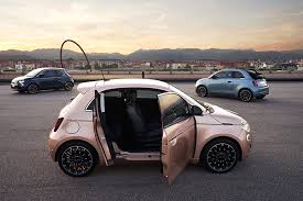 The fiat 500 isn't a car that you'd consider a fast and powerful one. Fiat Unveils The New 500 3 1 The All Electric Iconic Car Now Features An Extra Door