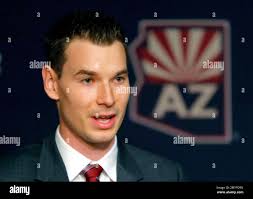 Newly appointed Arizona Coyotes general manager John Chayka speaks at a  news conference announcing his promotion, Thursday, May 5, 2016, in  Glendale, Ariz. Chayka is the youngest GM in NHL history. (AP