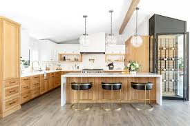 In my opinion this is too dark and once again just dates the space and makes it feel. Golden Oak Kitchen Cabinets With White Quartz Countertop Transitional Kitchen