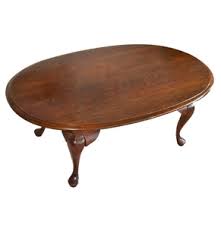 Often crafted in solid cherry, walnut. Lot Art Oval Queen Anne Style Coffee Table