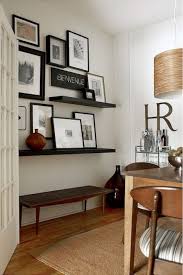Incorporate a floating shelf into a hallway gallery. Decorating Dilemmas Staging By M Home Decor Home Floating Shelves