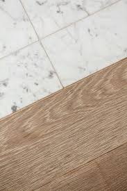 Kitchen tile and wood floor combination pictures. Ask Maria Can I Combine Faux Hardwood Tile With My Oak Floors Advice For Homeowners