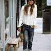 Check out this look which combines some minimally distressed boyfriend jeans with a black silk top, a blazer rolled to the elbows and a chic designer bag. 1
