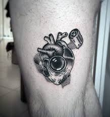 Camera tattoo designs have different meanings; Illussion Logo Simple Camera Tattoo Designs