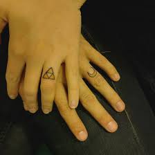 Check spelling or type a new query. My Husband And I Got Ring Finger Tattoos Tonight He Got A Crescent Moon For Me And I Got A Tri Force For Him Sailormoon