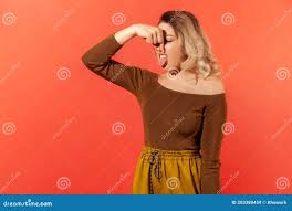 Blonde Woman Pinching Nose because of the Stink Stock Image - Image of  grimace, adult: 203380459