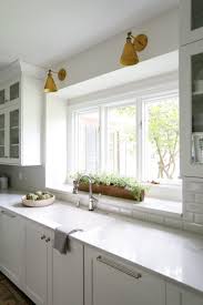 The wooden box above might be similar to many others in this list. White Kitchen Window Box Corinthian Fine Homes