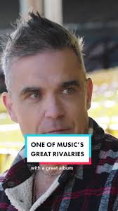 Robbie William Y Oasis