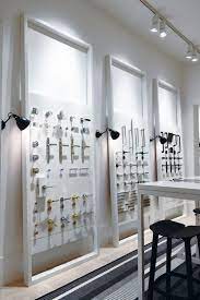 architectural door bathroom fittings designed by pittella est living showroom interior design showroom design lighting showroom