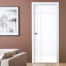 Modern sconces and a bddw lounge chair tie the space together. J B Kind White Contemporary Lyric Primed Flush Door Doors Interior Modern Doors Interior Bedroom Door Design