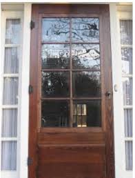 White aluminum self storing storm door with the following features: Custom Wooden Storm Doors X Amish Custom Doors