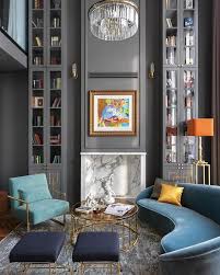 An Incredible Double Height Space With Vertical Lines To Accentuate The Height Beautiful Grey Wall With Built In Curio Cabinets A T Home Decor Interior Decor