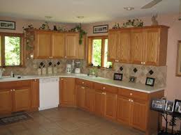 Kitchen Backsplash Ideas With Oak Cabinets And Surrounding Areas With Kitchen Remodeling Servi Trendy Kitchen Tile Trendy Kitchen Backsplash Oak Cabinets