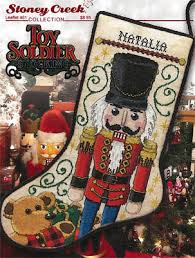 Presorted cotton thread, 14 count light blue aida, needle, and easy instructions. Stoney Creek Toy Soldier Stocking Cross Stitch Pattern 123stitch