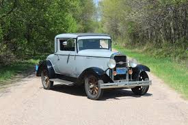 Image result for Scaraba Green 1930 Oldsmobile