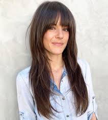 With so many trendy hairstyles and haircuts for long hair with bangs, it can be challenging to find the hottest cuts and styles to get right now. 50 Cute Long Layered Haircuts With Bangs 2021