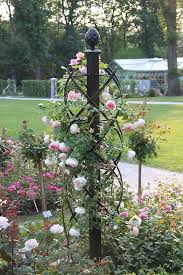Obelisks were originally made out of stone by the egyptians. Obelisk Trellis For Roses