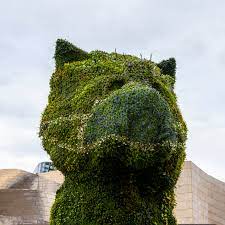 From begonias and petunias in spring and summer to pansies in winter. Jeff Koons S Puppy Sculpture Dons A Floral Face Mask