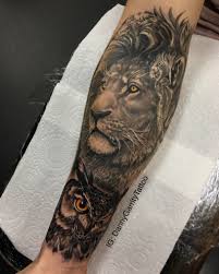 Lion And Owl Men S Sleeve Tattoo Design In Black And Grey Mens Sleeve Tattoo Designs Tattoo Sleeve Designs Lion Tattoo Sleeves