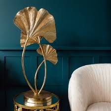 Metal led table lamp, gold leaf geometric simplicity done right, this gold geometric simplicity done right, this gold leaf stunner is worlds away from average. Gold Ginkgo Leaf Table Lamp Audenza