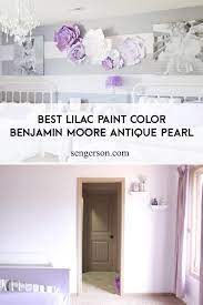 A master bedroom setup with medium tones for everything from flooring to beds, then it is bedroom painted in subdued lavender color gives a fresh look. Benjamin Moore Antique Pearl The Best Subtle Lilac Paint Color