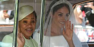 10 things you missed about meghan markle's wedding dresses. Meghan Markle S Mother Doria Ragland Wore Oscar De La Renta And Nose Ring To Royal Wedding