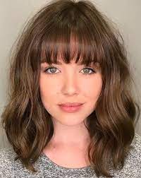 This amazing haircut sharpens your features and ameliorates your this is another cool hairstyle for shoulder length hair. 50 Best Styles For Medium Length Hair With Bangs Hair Adviser