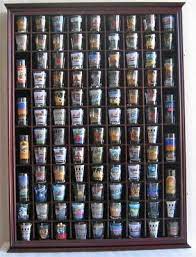 This frameless showcase lets your merchandise take the spotlight. 12 Best Shot Glass Display Cabinet Ideas Shot Glass Glass Display Case Shot Glasses Display