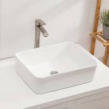 A decorative vessel bowl sitting on a piece of imperial white marble counter top bring contrast effect and draw focus. Boyel Living 22 In W X 18 In D Above Counter Ceramic Rectangle Bathroom Vessel Sink White Sl Lmp18001 Ss The Home Depot