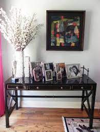 Use these console table decor ideas to style the perfect arrangement in your home. 9 Picture Frames On Console Table Ideas Home Decor Decor Living Room Decor
