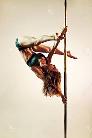 Here is a list of pole dancing poles i consider. Young Slim Sexy Strong Pole Dance Woman Upside Down Warm Colors Stock Photo Picture And Royalty Free Image Image 70310529