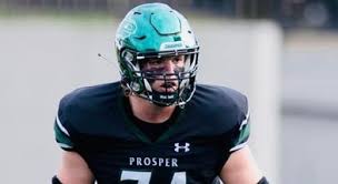 Where will 5-star WR Dakorien Moore play college football?