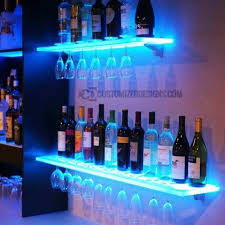 This affordable, industrial chic floating shelf holds a dozen bottles of liquor or wine. Led Floating Shelves W Wine Glass Rack Floatingshelvespipe Bar Aydinlatmasi Bodrum Bar Tasarimlari Bar Ev
