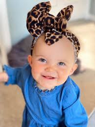 Ann Marston stringing her bow at a Sports Illustrated exposition***